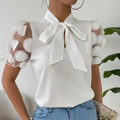 Damskjorta med enfärgad fluga och kortärmad design