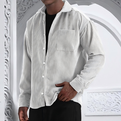 Herrskjorta i enfärgat tyg med långa ärmar