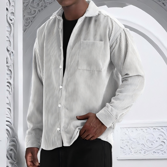 Herrskjorta i enfärgat tyg med långa ärmar