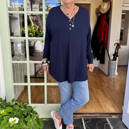 Damtröja med V-ringning, korta ärmar och knappar