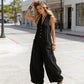 Ärmlös jumpsuit med V-ringning och vida ben för damer