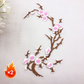 Elegant strykmärke med plommonblomstmotiv