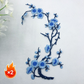 Elegant strykmärke med plommonblomstmotiv
